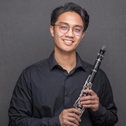 Dexter Hidalgo holding a clarinet