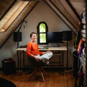 Caroline Shaw sitting at a desk