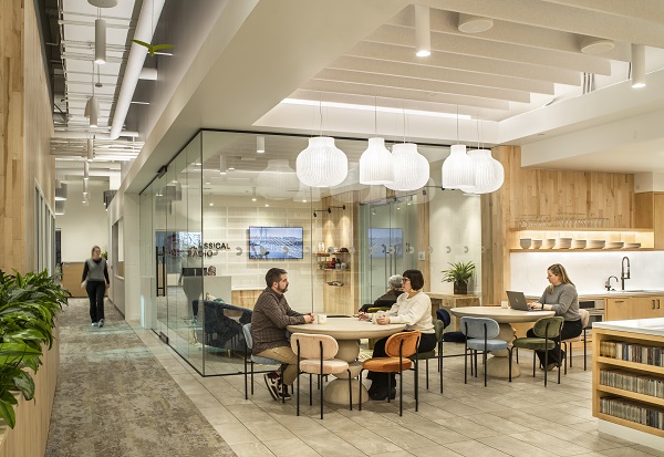 Office cafe with several people seated at tables