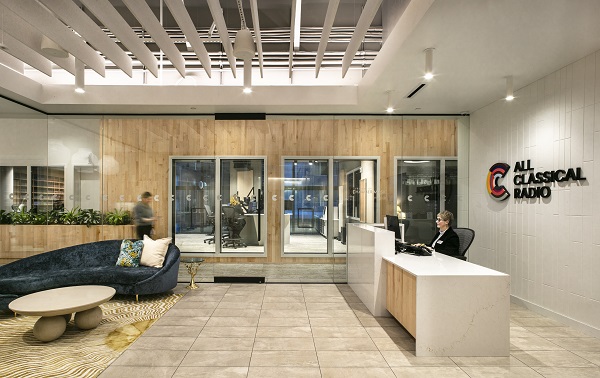 Office lobby with volunteer sitting at front desk