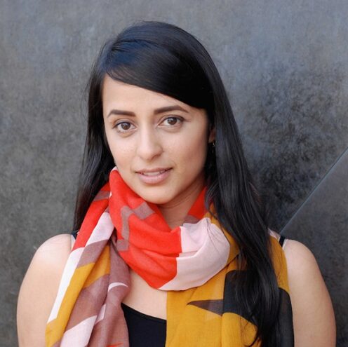 Reena Esmail wearing colorful scarf